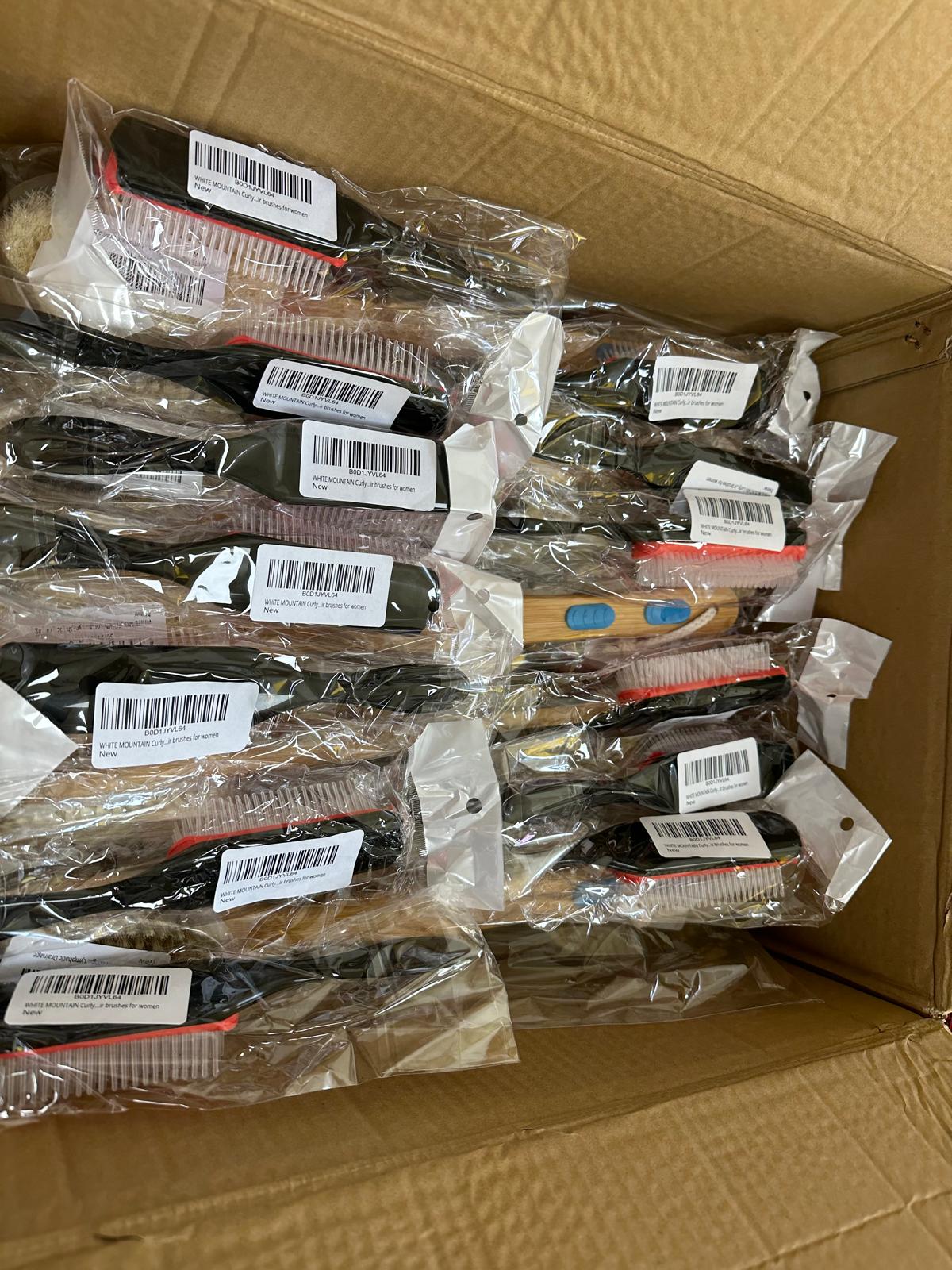 Hair brushes individually polybagged and barcoded ready for fulfilment