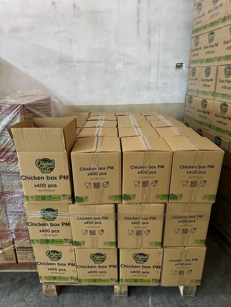 Palletised Chicken box PM cartons stored on a wooden pallet in the TERA Fulfilment London warehouse